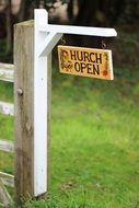 A sign near the gate to the church