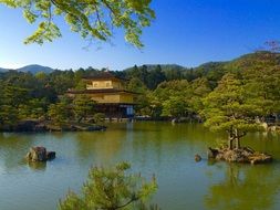 distant view of the temple of the golden pavilion in japan