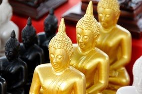 colorful buddhas in a temple in bangkok