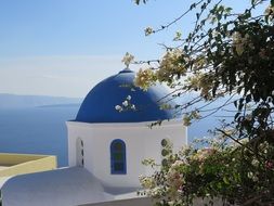 blue dome of a church in Santorini