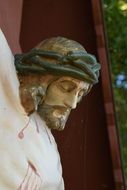 jesus on a roadside cross close-up