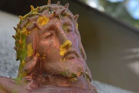 jesus on the field cross close-up