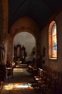 Sunlight through Stained Glass Window in church