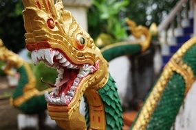 colorful deity in a temple in laos