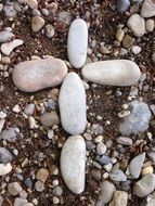 cross of pebbles closeup