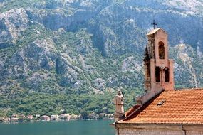 landscape of bell tower in a chapel among beautiful nature