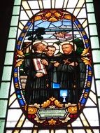 catholic saints, stained glass church window in Paraguay