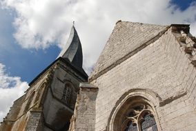 flamboyant gothic church of St. Omer, dating from the seventeenth century, with its twisted spire, France, Verchin