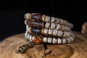 Buddhist rosary with brown stones and pearls