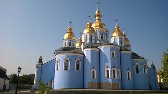 blue church with golden domes in kiev