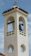 white belfry of a church in Ayia Marina