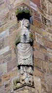 religious statue on the corner of the church