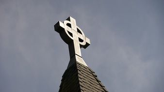 large cross on a church steeple close-up