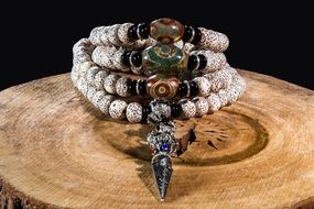 Buddhist rosary with pearls and different stones