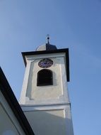 clock tower of a church in south tyrol