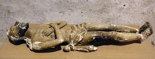 statue of the dead christ in the abbey in the eastern pyrenees