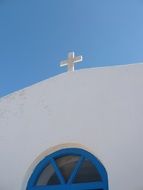 white cross on top of Church at sky, Greece, Cyclades