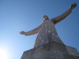 sculpture of jesus christ in barcelona in the sunshine