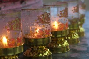 lighting candles in a chinese temple