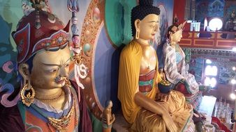 statues of buddhist gods in the temple