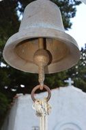 brass bell in a church in greece