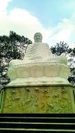 huge statue of white buddha in vietnam