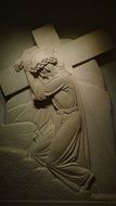 Jesus with cross on shoulder, relief