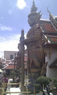huge guard dragon of buddhist temple in Bangkok