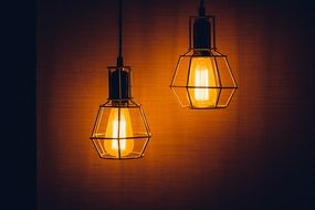 two electric lights In the dark