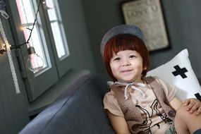 cute child girl posing in Studio at Light Bulb