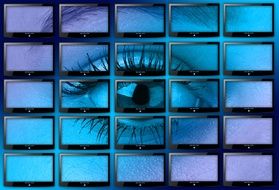wall of monitors with eye picture