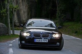 black bmw on the road