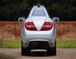 silver Mercedes in distorted image