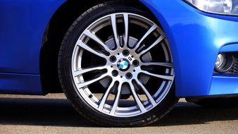 wheel of luxurious blue BMW