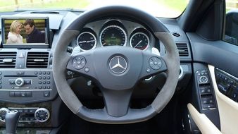 modern dashboard of a luxury Mercedes without a roof