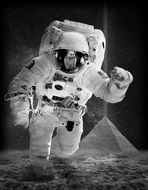 astronaut on the moon in black and white image