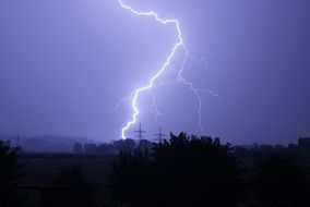 thunderstorm and lightning flashes over the city