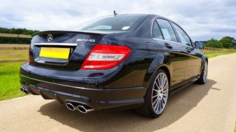 rear view of a luxury black Mercedes