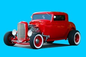 red vintage car on a blue background
