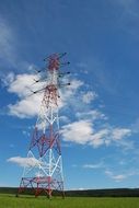red-white high voltage tower