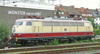 electric train near the wall with munster sign