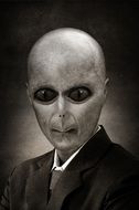 black and white portrait of an alien