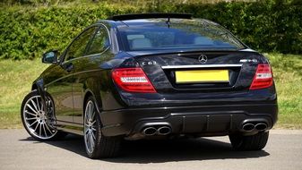 rear view of a luxury Mercedes on a sunny day