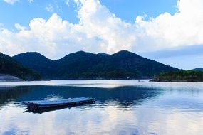 raft on the lake against the backdrop of the mountains