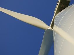 wind turbine against blue sky background