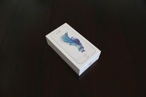 white apple iphone box on the table