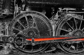 connecting rods on a steam train