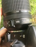 Mirror camera in hands close up
