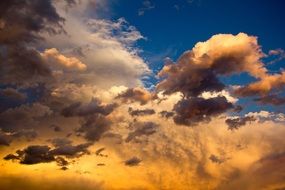yellow thunderclouds in the blue sky