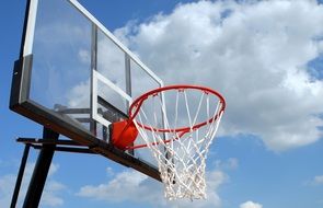 red basketball hoop on the court